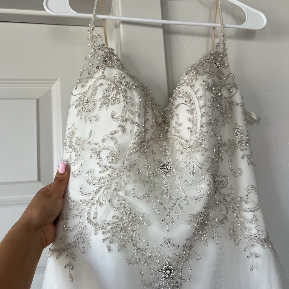Elegant White Beaded Wedding Dress - Picture 6 of 7